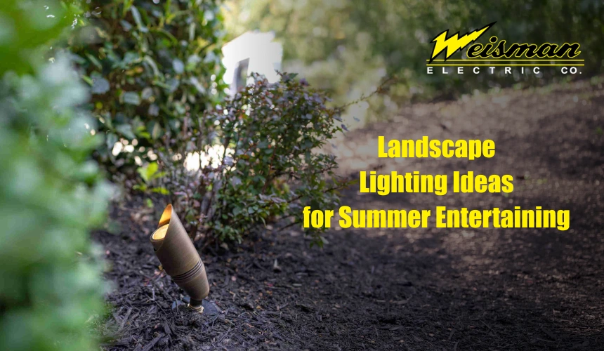 Beautiful backyard landscape lighting illuminating a patio and garden at night
