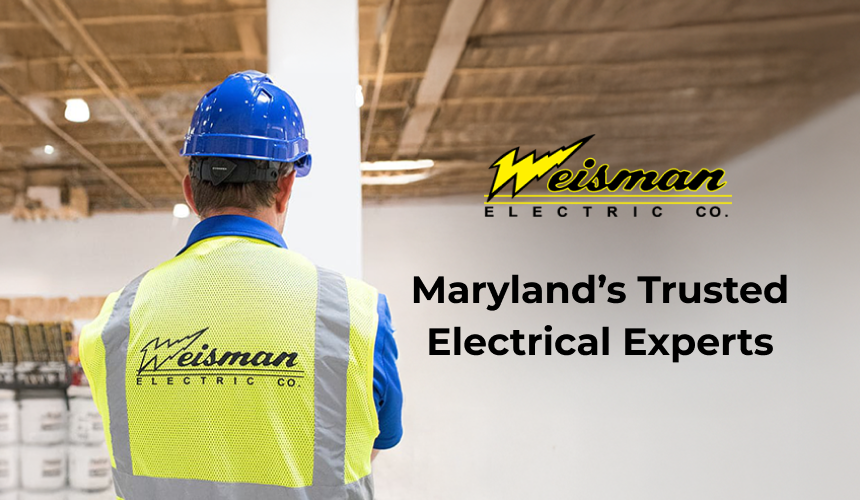 Weisman Electric Co. electrician installing a fire alarm system in a home.